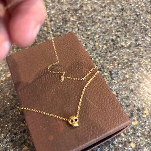 Michelle Chang baby skull necklace